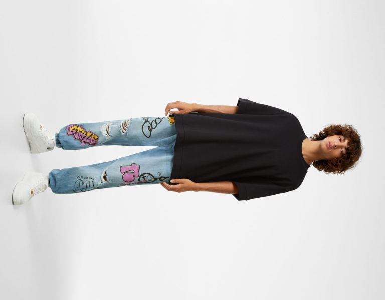 Light Blue Men\'s Bershka Ripped Printed Jogger Jeans | AcpEYsNQTMR